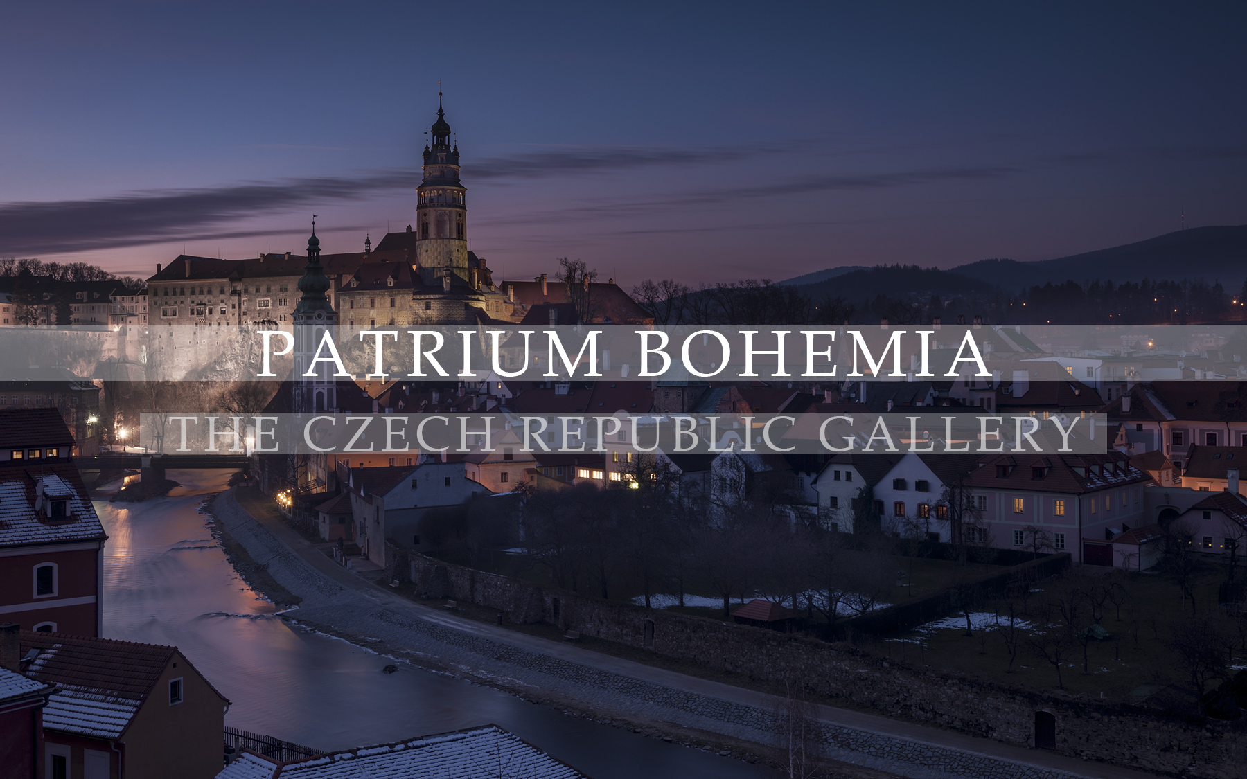 Opening photograph of the Patrium Bohemia gallery. Cesky Krumlov in the winter twilight.